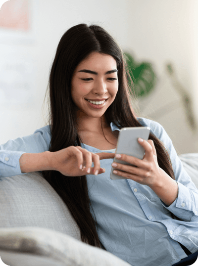 Woman looks at phone