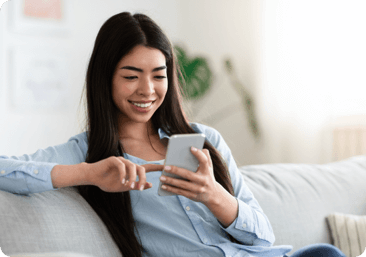 Woman looks at phone